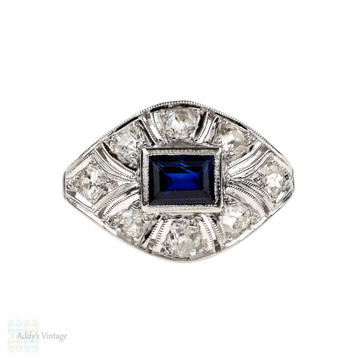 Art Deco Bombé Style Platinum Cocktail Ring. Old European Cut Diamonds & Baguette Cut Blue Sapphire.