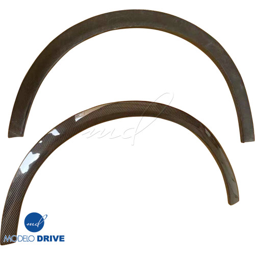 ModeloDrive Carbon Fiber NISM Fender Flares (rear) 2pc > Nissan 350Z Z33 2003-2008 - image 1