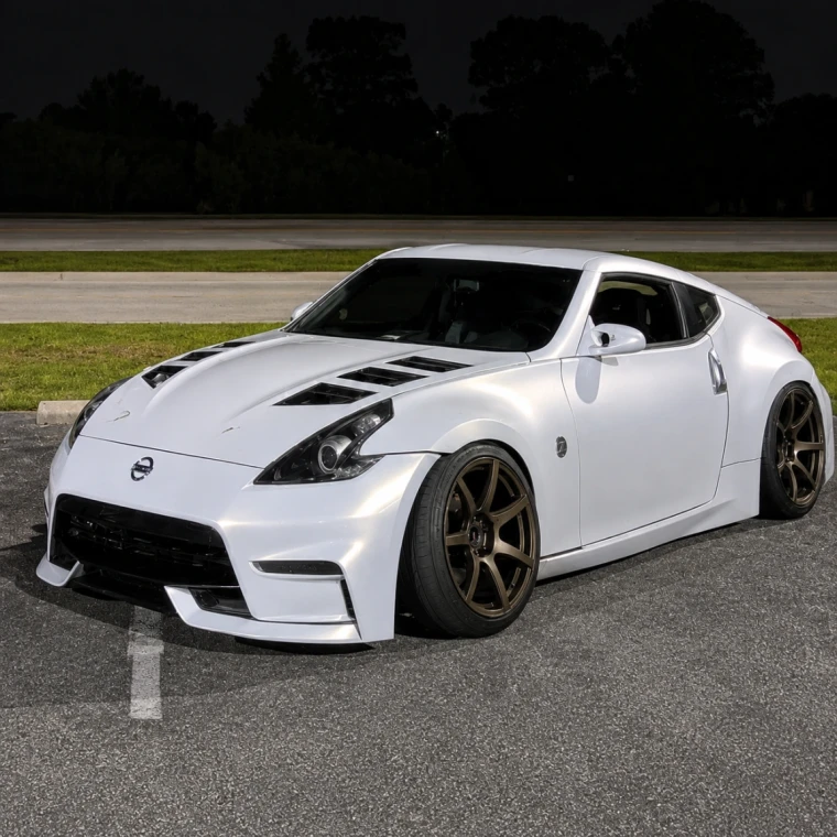 Nissan 370Z 2009-2020 Nismo V2 Style 1 Piece Polyurethane Front Bumper - image 1