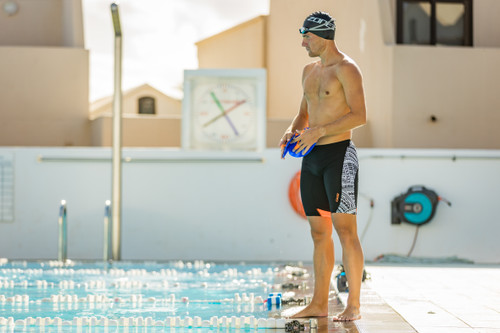 ZONE3 - Kona Men's Tribal Print Speed Jammers - Black/White/Orange - 2025 ZONE3 - Kona Men's Tribal Print Speed Jammers - Black/White/Orange - 2025