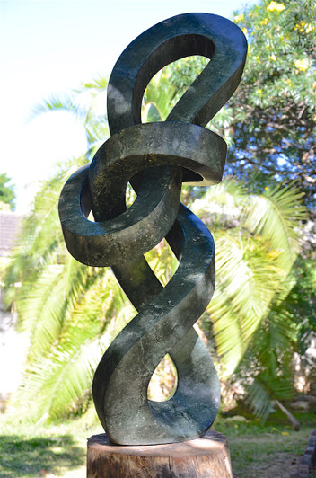 Shona Stone Sculpture from Zimbabwe titled 'Infinity' by Victor Matafi Shona Stone Sculpture from Zimbabwe titled 'Infinity' by Victor Matafi