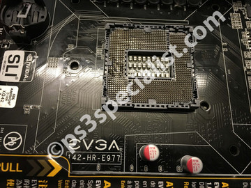 The damaged CPU socket that needs to be replaced