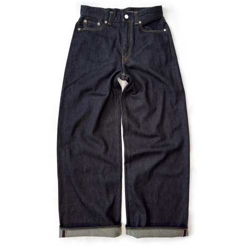Front view of indigo Momotaro women's Super Wide jeans laid flat on white, showing front pockets, wide legs and turned-up selvedge hems.