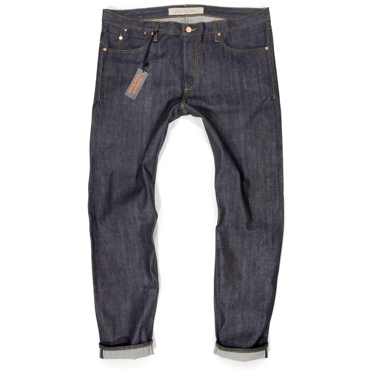 A photograph of Williamsburg Garment Company selvedge slim tapered jeans made in the United States for big men against a white background. These size 42 waist, 13-ounce raw denim jeans are named the Hope Street fit. They are handcrafted with the pocket bags autographed by designer Maurice Malone and his staff in Brooklyn, New York.