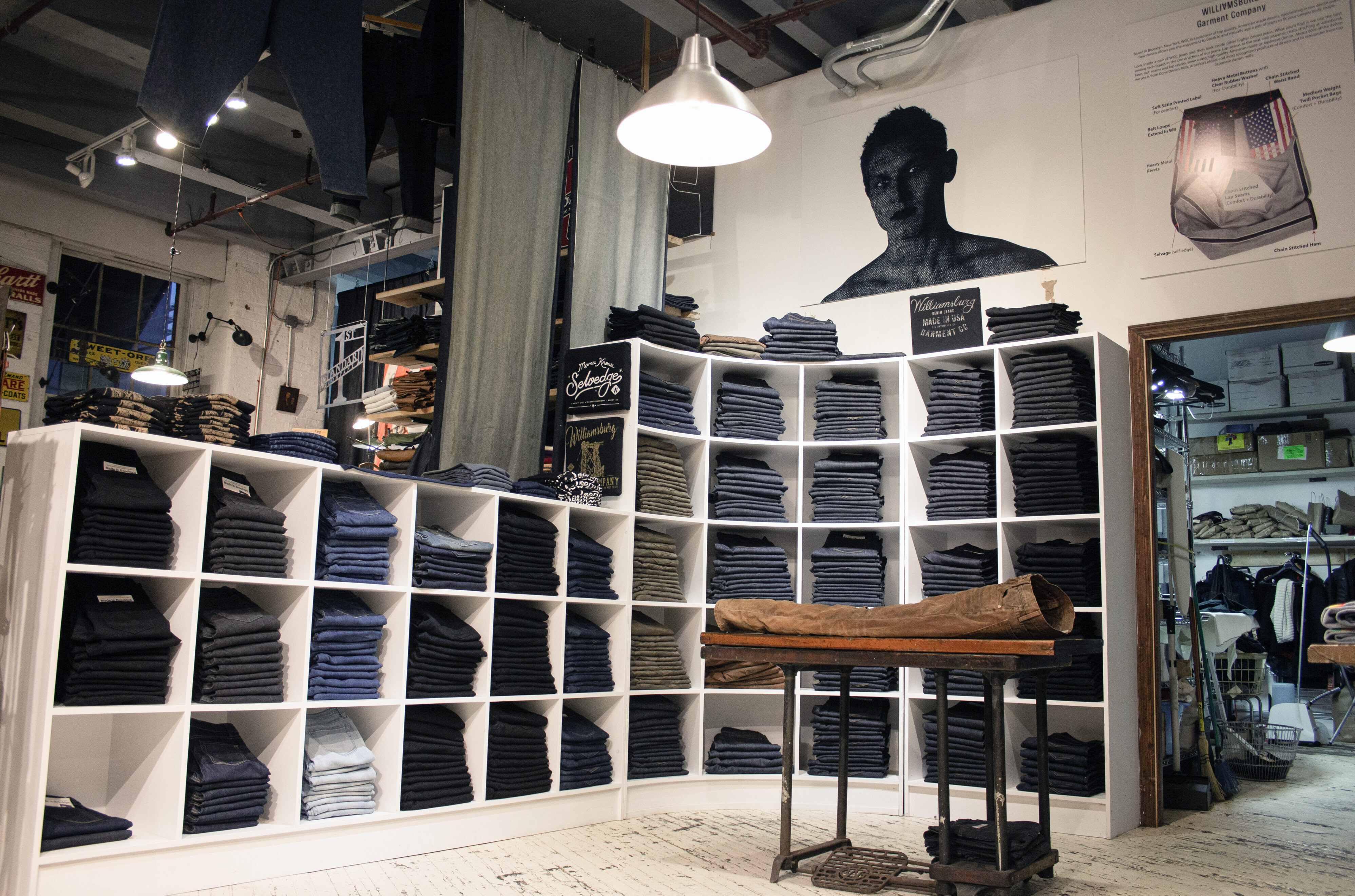 Williamsburg Garment Company’s in-store presence at 80 N Third Street, inside Brooklyn Denim Co. on February 14, 2018, shortly after moving operations into the space. The image captures denim displays, retail shelving, and the early collaborative retail environment.