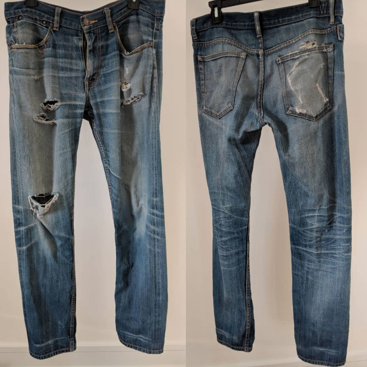 Williamsburg Garment Company 5-year-old raw denim jeans with holes and tears in need of denim repairs.