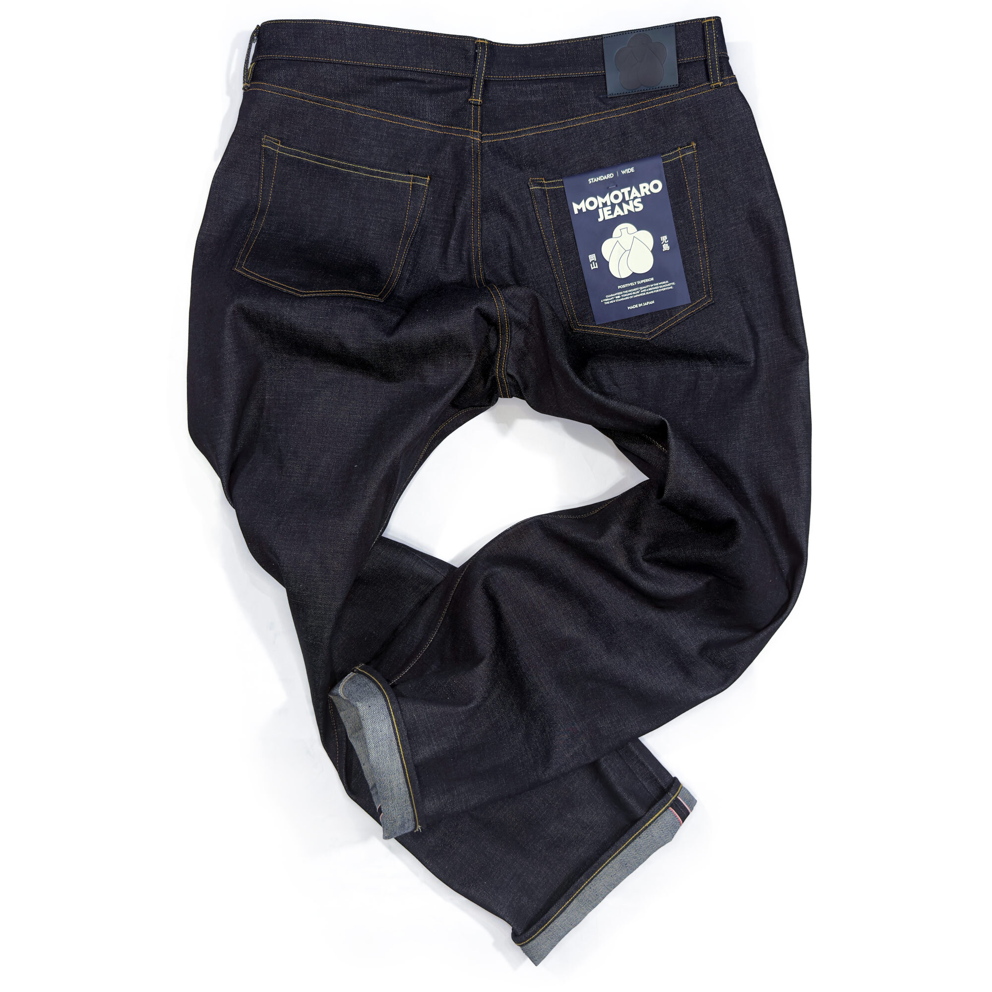 Rear view of big men’s Momotaro #400 Standard Wide fit selvedge jeans in dark indigo Japanese denim with a relaxed straight-leg silhouette.