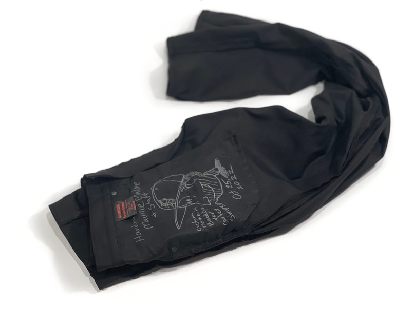 Signed by designer Maurice Malone, custom fitted denim jeans in stretch black fabric.