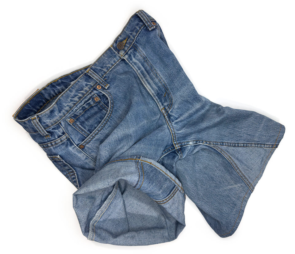 Cuffed denim shorts made by merging two vintage jeans in light and dark washes, showcasing expert denim customization by Williamsburg Garment Company.