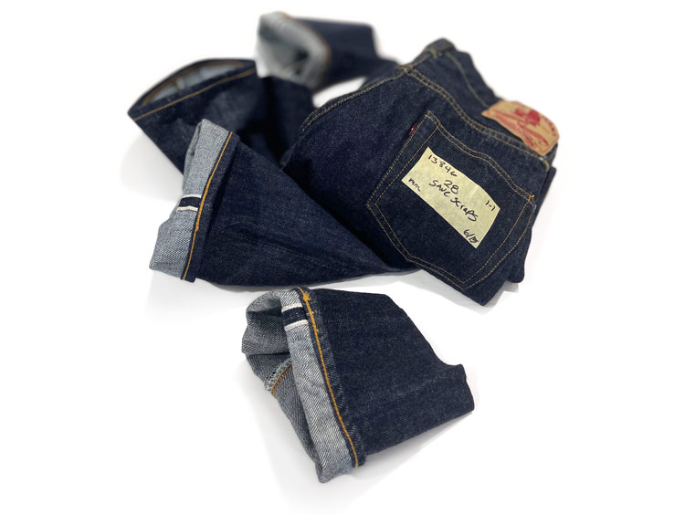 Ladies TCB jeans in selvedge denim, with a request to save denim scraps after chain stitch hemming in order to shorten the jeans to a 28-inch inseam. Williamsburg Garment Company provided the alteration service.