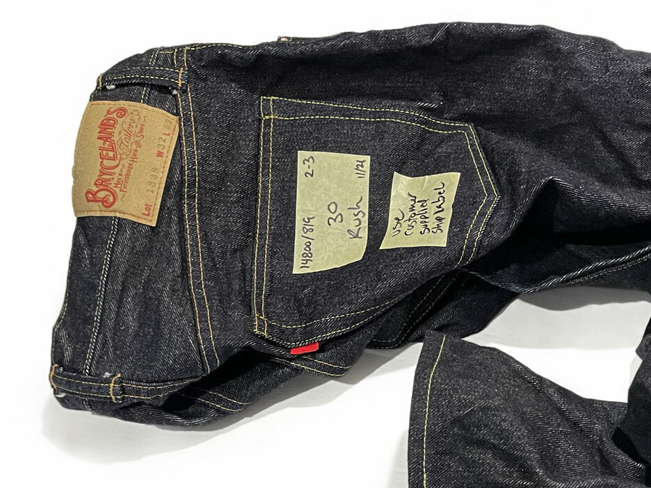    A close-up of a pair of Bryceland's & Co. denim jeans leads to a story about same-day alterations and chain stitch hemming services.