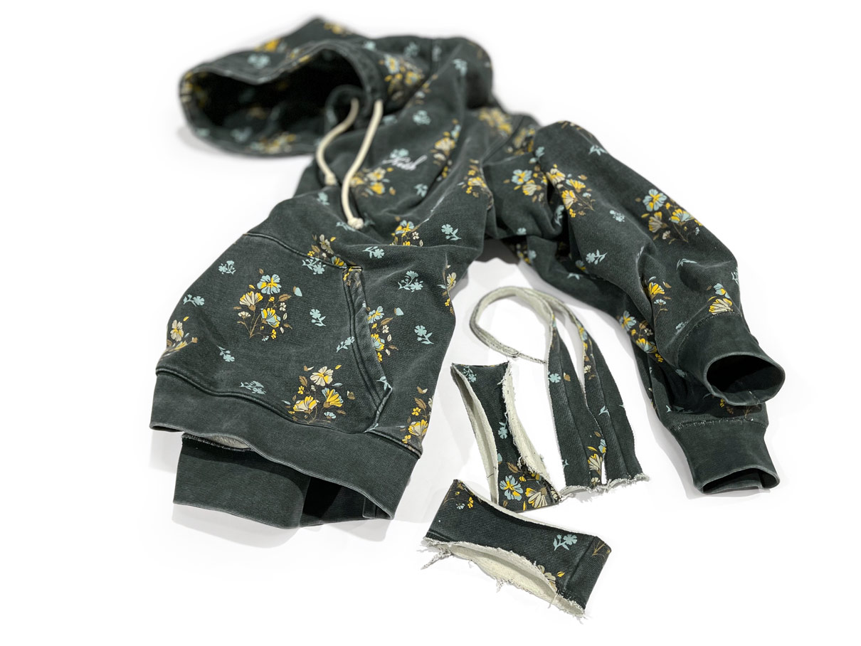 Green floral printed Kith hoodie with sleeve shortened alterations