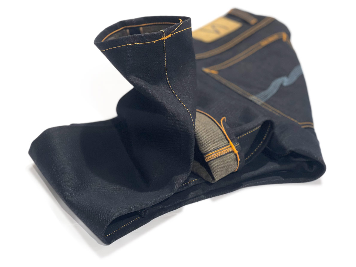 A pair of Nudie selvedge jeans that were tapered and hemmed by Williamsburg Garment Company, the best jeans tailor in the world.