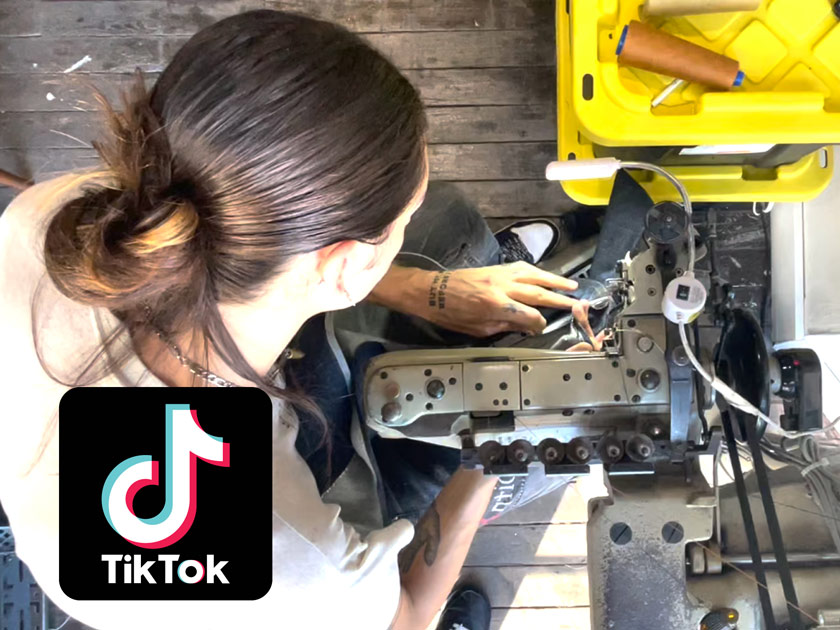 TikTok video shows how to take in the waist on jeans and taper them professionally at the same time.