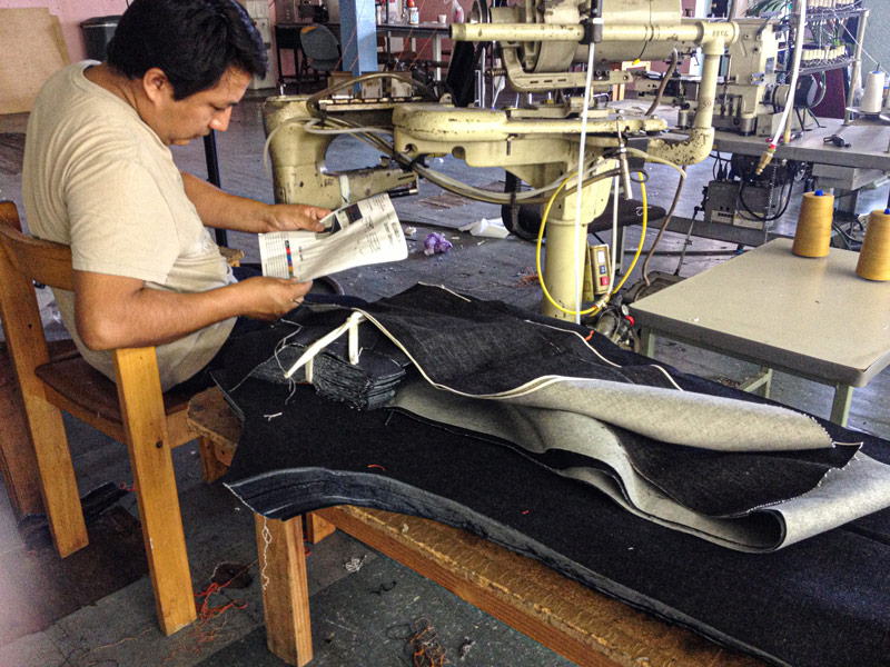 Los Angeles denim factory owner Fransico sewing