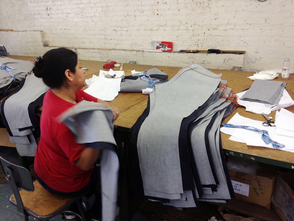 Lady sorting jeans at LA denim factory