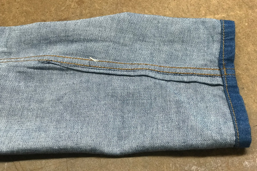 How do I fix this jeans hem? I took them to a tailor and now the hem