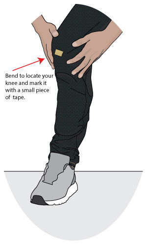 Drawing explains how to taper jeans by marking the knee position