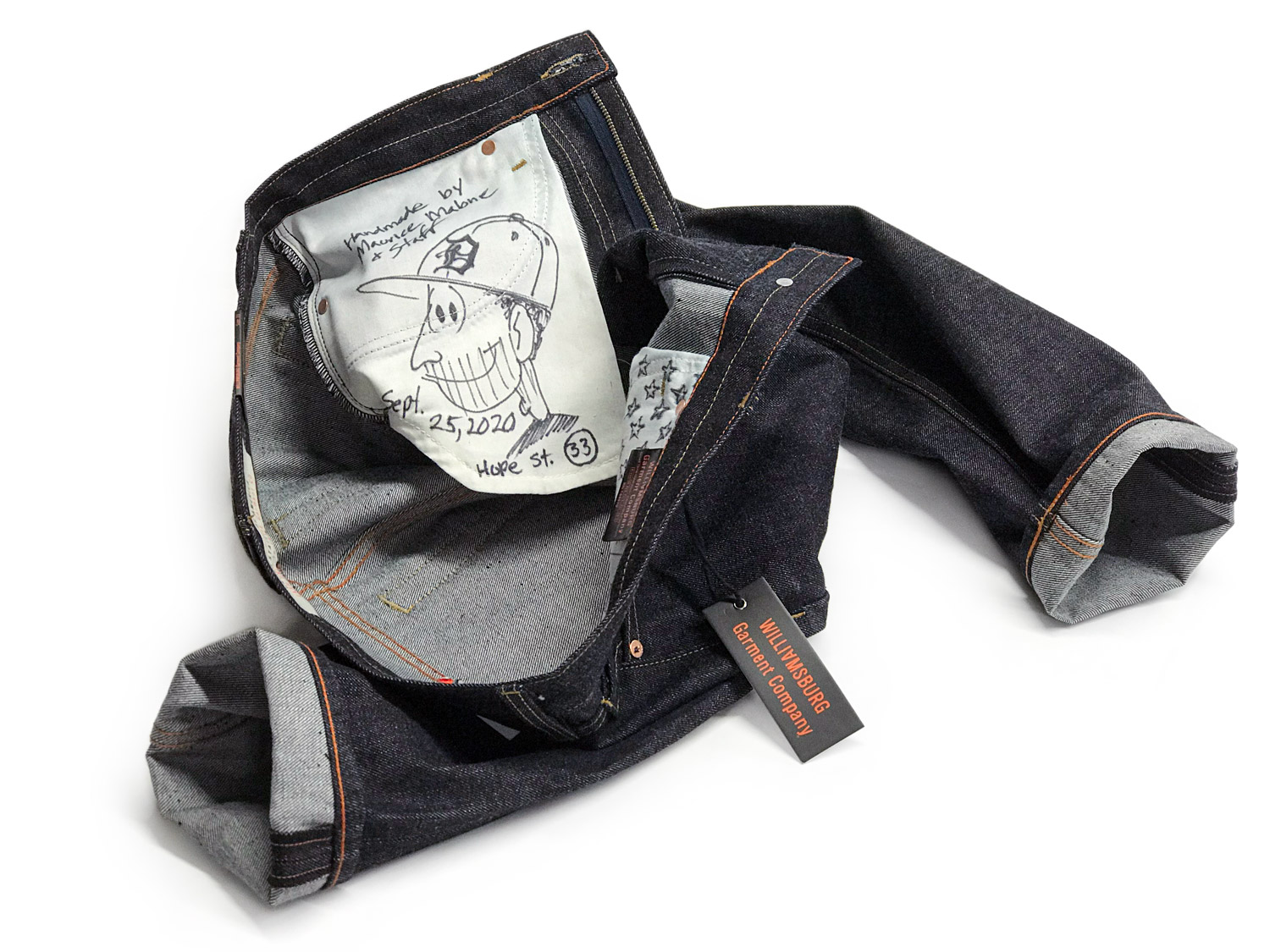 Pocket bags autographed by designer Maurice Malone short men's custom-made jeans in slim tapered fit and size 33x28