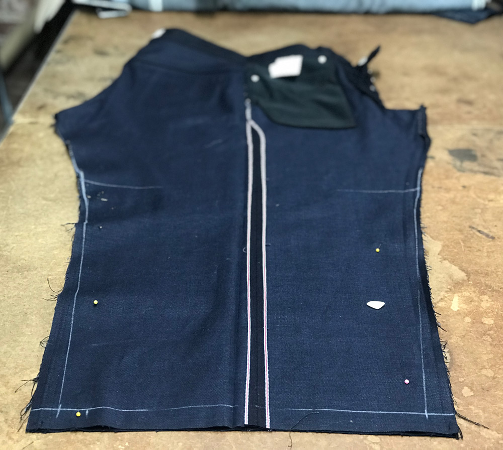 Selvedge jeans opened from the inseam in the process of tapering