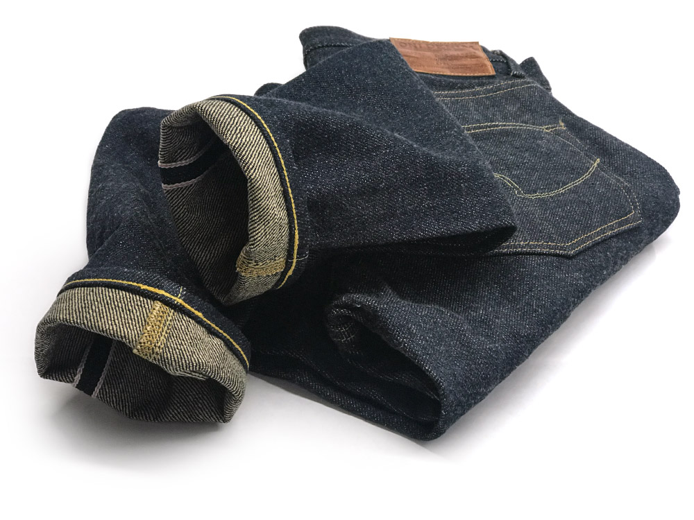 A pair of heavyweight Oni Denim jeans after chain stitch hemming service by Williamsburg Garment Company.