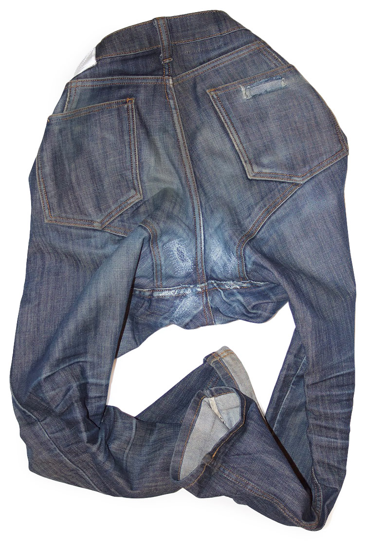 Rear view of Cadence jeans with crotch blowout