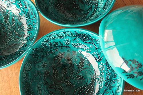 20cm handmade and hand painted ceramic bowls.  In a deep jade green with black intricate details.