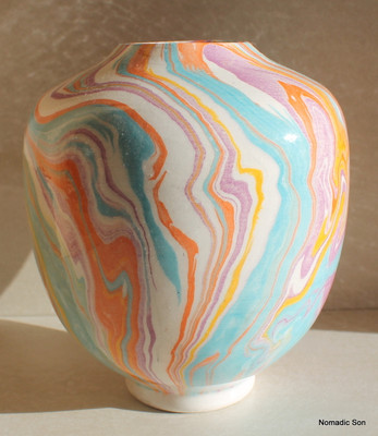 This incredible vase is a completely unique one off vase made by Elagoz (the only artist in the world to master Ebru on ceramics).  Sublime swirling patterns; a blend between the artist and the uncontrollable nature of Marbling.