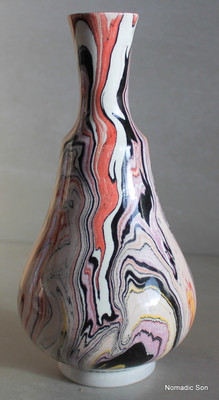 This incredible vase is a completely unique one off vase made by Elagoz (the only artist in the world to master Ebru on ceramics).  Sublime swirling patterns; a blend between the artist and the uncontrollable nature of Marbling.