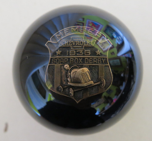 we discovered an antique lapel pin at an estate sale to make this rare shift knob.