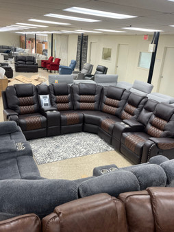 Dark leather reclining sectional