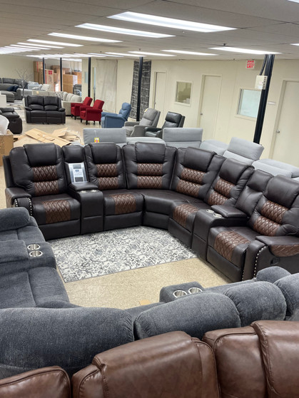 Dark leather reclining sectional