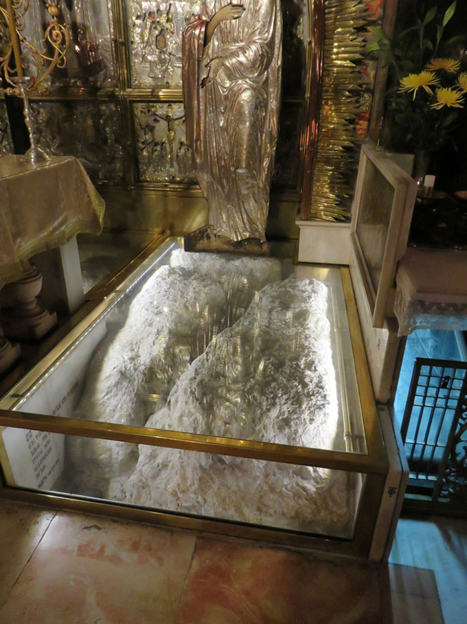 The rent rocks at the Shrine of Golgotha