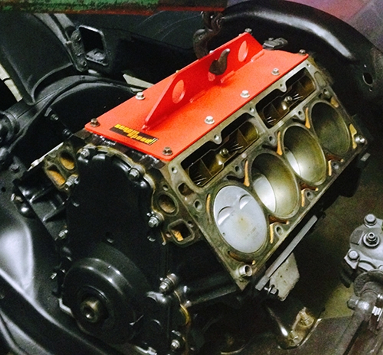Customer provided image: Note: It is not necessary to remove the cylinder heads to use our lift plate.