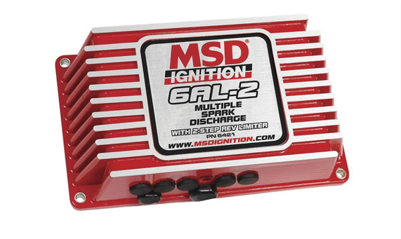 MSD 6421 6AL-2 Digital Ignition Box W/2-Step Rev Control, automotive ignition control box with cooling fins and multiple ports for spark discharge control.