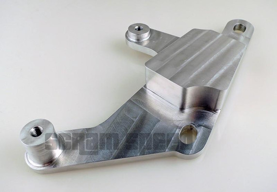 CNC-machined billet aluminum bracket designed to mount modern Ford drive-by-wire throttle pedals in 79-2004Fox Mustang.