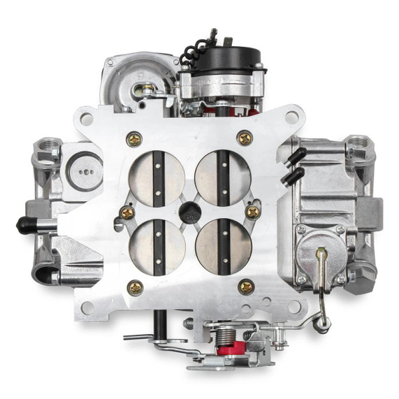 Quick Fuel Technology – Carburetors & Fuel Systems QFT SL-600-VS Slayer Series Carburetor -600 CFM, metallic silver fuel system component with multiple circular and cylindrical parts, black and brass accents, and various connection ports.