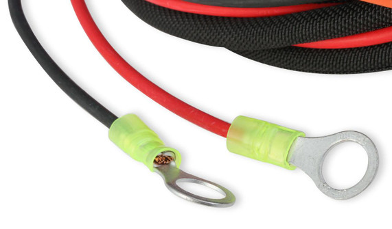 Holley Performance Parts – EFI, Intakes, & More Holley 556-151 Sniper EFI Hyperspark Ignition Box, close-up of ignition wires with ring terminals and protective yellow insulation.