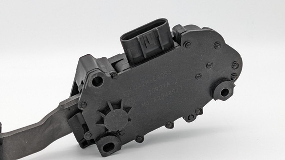 GM Drive By Wire Pedal assembly with TPS Sensor, automotive throttle pedal and sensor component mounted on black plastic housing.