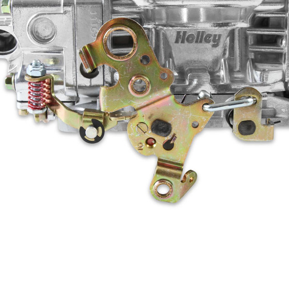 Holley Performance Parts – EFI, Intakes, & More Holley 0-4777S MODEL 4150 650 CFM CARBURETOR, close-up image showing the carburetor linkage components and metallic body.
