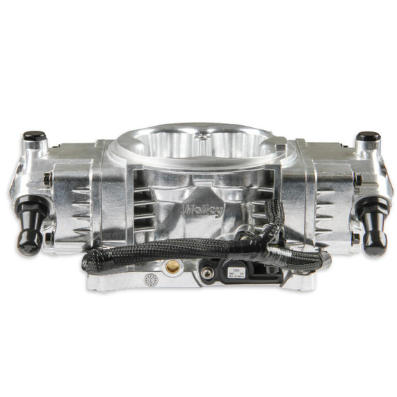 Holley EFI Holley 550-1011 Terminator X Max Stealth with trans control, automotive engine control module in a metallic silver finish with connectors and wiring.