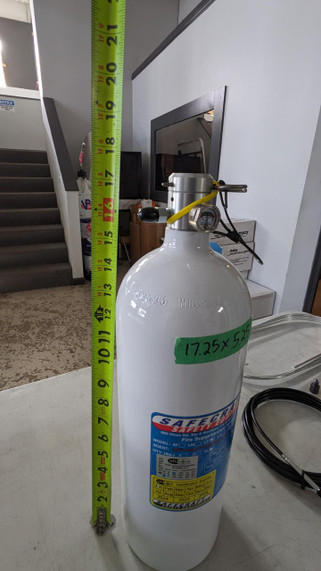 Safecraft LT10JAA 10 lb. Pull Cable Chassis Fire Protection System, a white cylindrical fire suppression unit with a pull cable and gauge, measuring approximately 17.25 inches in height with spatial dimensions of 5.25 inches wide.
