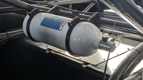 Safecraft LT10JAA 10 lb. Pull Cable Chassis Fire Protection System, mounted on a vehicle chassis for fire extinguisher activation.