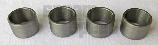 Scram Speed Small Block Ford Cylinder Head Dowel Kit, four metal cylinder head dowels placed in a row on a white surface.