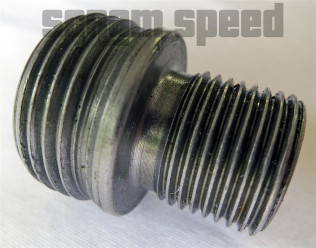 Scram Speed Small Block Ford V8 Oil Filter Insert Adapter, engine oil filter insert with cooling fins and threaded design for automotive application.