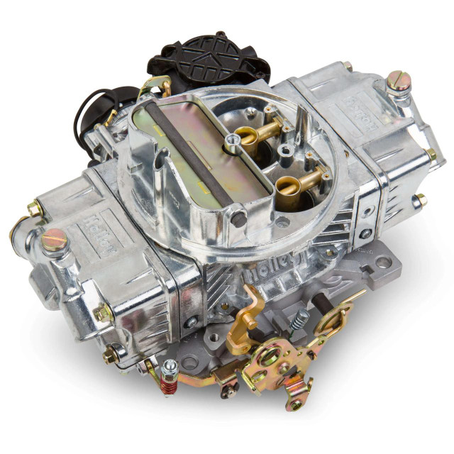 Holley Performance Parts – EFI, Intakes, & More Holley 0-80870 4150 870CFM STREET AVENGER fuel carburetor, metallic silver with brass and black components.
