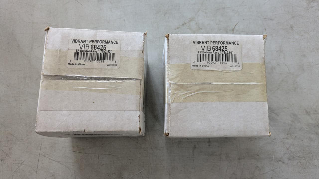 Vibrant 68425 Bellows Assembly with Solid Liner, two boxed industrial parts with label details.