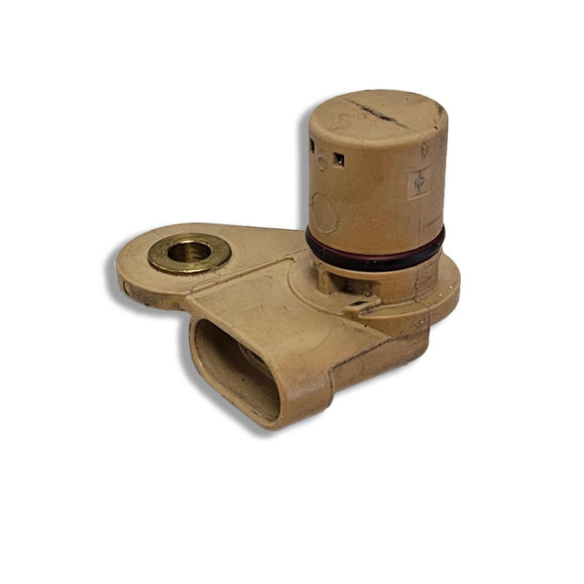 Scram Speed SNS134 GEN 4 CAMSHAFT SENSOR, automotive engine sensor in beige color with cylindrical body and mounting bracket. Scram Speed SNS134 GEN 4 CAMSHAFT SENSOR, automotive engine sensor in beige color with cylindrical body and mounting bracket.