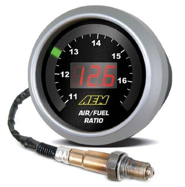 AEM Digital UEGO Wideband Air/Fuel Gauge, digital car gauge with a black face, red LED display, and green indicator light, used for measuring air/fuel ratio in vehicles.