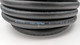 Fragola 870006 3/8" BLACK PUSH LOK PER FOOT, close-up of coiled black push lock hose with white text and specifications printed on it.